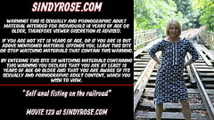 Self anal fisting on the railroad Thumb