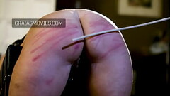 Cane Fits on Slave Girl'_s Bottom Thumb